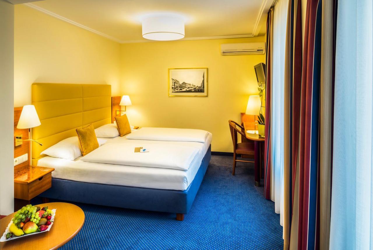 Chambre Triple PREMIUM - Vue sur Cour